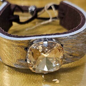 Cowhide and leather gold leopard bracelet with big shiny rhinestone